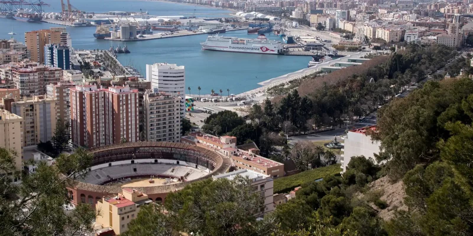 Aerial view of Málaga's port and the Costa del Sol coastline, a dialysis holiday destination