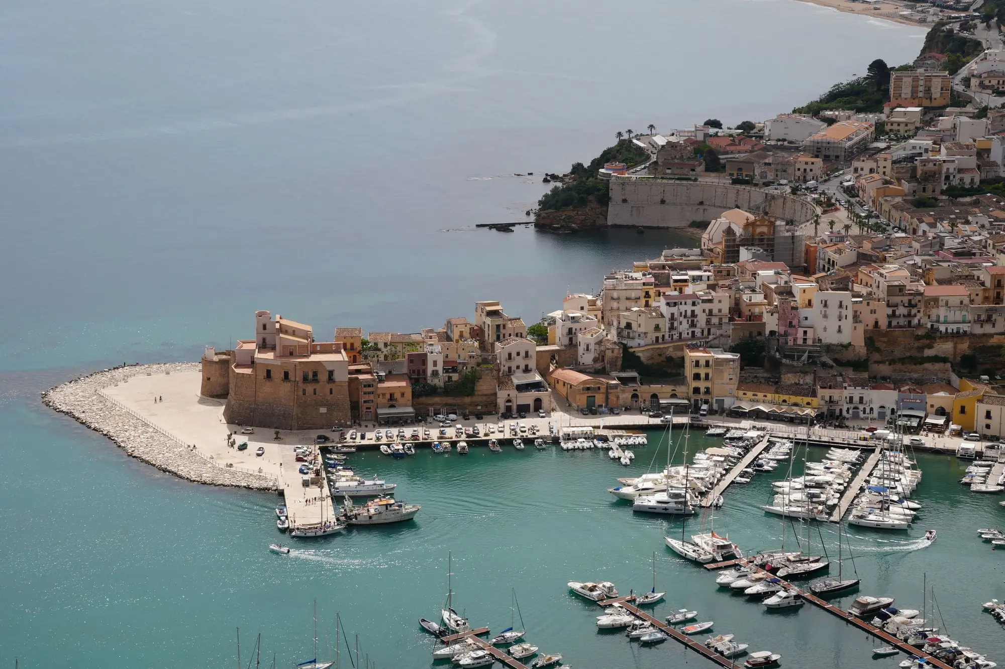 Aerial view of the fortress and marina at Castellammare del Golfo, Sicily, a dialysis holiday destination